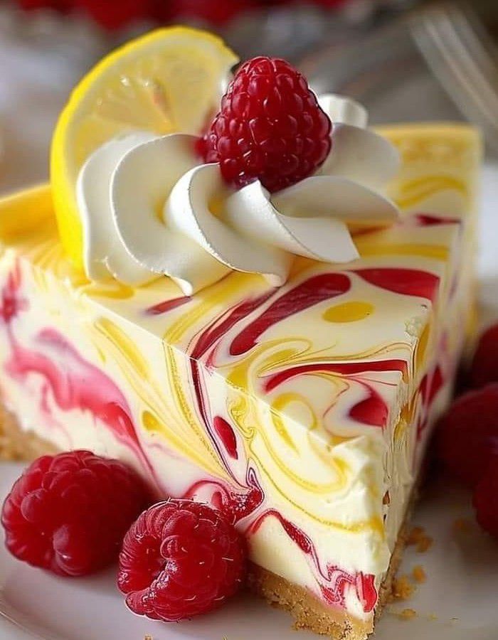 Luscious Lemon Raspberry Swirl Cheesecake