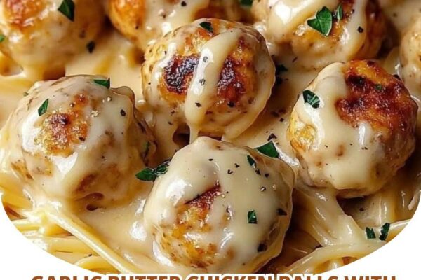 Juicy Garlic Butter Chicken Balls served over creamy Parmesan pasta for a rich and flavorful meal.