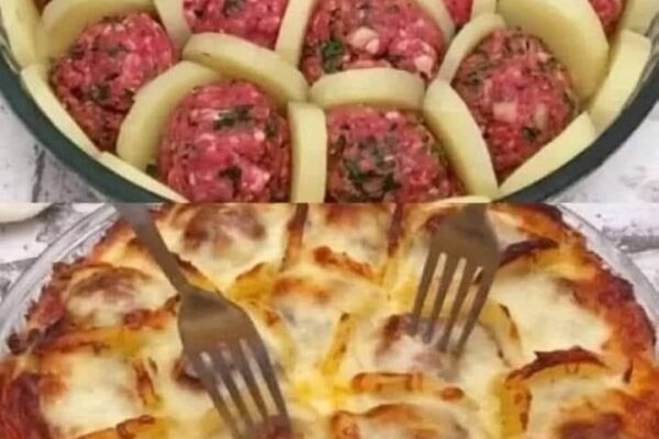 Golden baked potatoes layered with meatballs and melted cheese, a delicious French-inspired dish