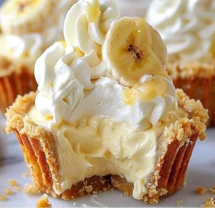 Delicious banana cream pie cupcakes with a fluffy texture, creamy filling, and a golden crust.