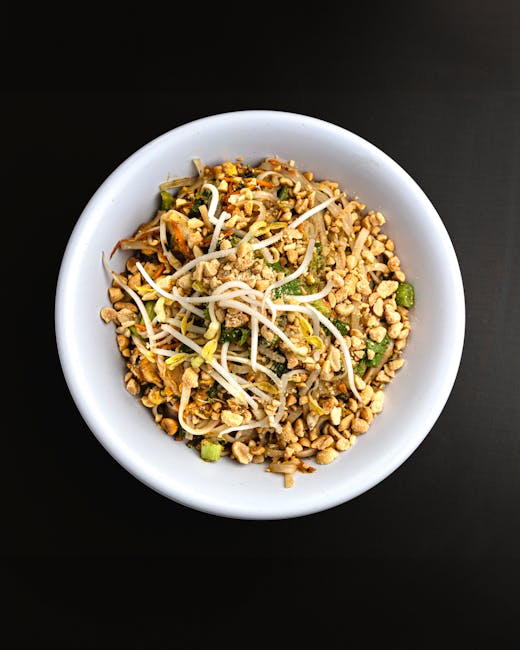 Vegetable pad Thai with tofu and crushed peanuts